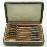Set of six silver niello teaspoons, contained in a fitted leather case, weight 2.6 oz. approx.