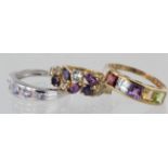 9ct multi gem set dress ring, size K, weight 3.6g. 9ct channel set multi gem set dress ring, size R,