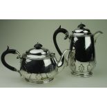 Silver tea pot and coffee pot. Hallmarked Sheffield 1931/36 by Walker & Hall. total weight approx