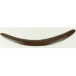 Aboriginal hunting boomerang, circa late 19th Century to early 20th Century, with incised paw