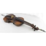 Violin & bow, circa late 19th Century, both unnamed, in need of restoration, violin back 36cm