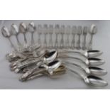 Part suite of 36 Georgian silver Queen's Pattern Oyster backed flatware comprising nine tablespoons,