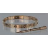 Ladies 18ct gold & diamond Cartier "Love" bangle, signed and numbered Cartier, RE1879 with
