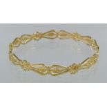 22ct yellow gold fancy patterned slave bangle, weight 16.6g