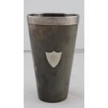 Horn beaker with silver rim and silver shield to side depicting a tall ship, hallmarked 'London