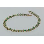 9ct emerald and diamond line bracelet, 19cm long, weight 6.7g