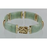 14ct yellow gold wide jade sectioned bracelet with box clasp, 20cm long, weight 29.3g