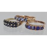 Three rings to include 15ct sapphire five stone ring, 14ct sapphire and diamond three row ring (1