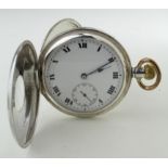 Silver cased half hunter pocket watch, white enamel dial with Roman numerals, subsidiary dial,
