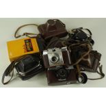 Cameras. A collection of eight vintage cameras, comprising Kodak Junior II (boxed), Ilford Sporti,