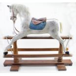 Rocking horse, with horse hair main and tale, circa early 20th Century, fitted with sadle & reins,