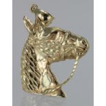 14ct pendant in the form of a horses head, approx 7.4g