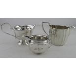 Three silver, milk/cream jugs all have British hallmarks for Birmingham 1922, 1924 & Sheffield,