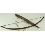 African hand made bow with quiver covered in animal hide & six steel tipped arrows, circa 19th