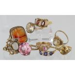 Nine 9ct yellow gold rings set with mixed semi precious gemstones and paste, total weight 45.1g