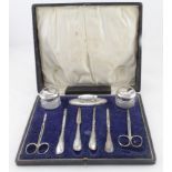 Silver matching nine piece manicure set (scissors not silver), hallmarked 'W&S Ltd, Birmingham