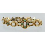 9ct bracelet set with opals and emeralds with box clasp and safety chain, weight 14.3g