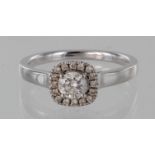 Platinum diamond cluster ring, principal diamond certificated 0.38ct, surrounded by 0.12ct in halo