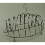 Georgian silver toast rack - has a few repairs to the base. Hallmarked R&S Hennell, London 1797.