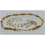 Two 9ct gold bracelets, one charm bracelet, weight 3.2g, and one double woven mesh bracelet,