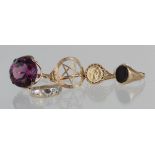 Five 9ct rings to include onyx set signet ring, paste set dress ring, "coin" ring, star ring and