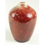 Bernard Moore. Small red glazed vase, signed to base 'Bernard Moore 2'