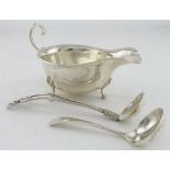 Silver sauce boat, raised on three feet, hallmarked 'GM&S, Birmingham 1936', length 15cm approx.,