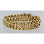 18ct yellow gold fancy link bracelet with box clasp and safety, and horn of plenty charm, weight