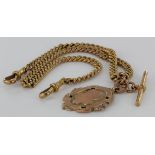 9ct gold hallmarked "T" bar pocket watch chain with sporting ? medal attached. Approx length 37.5cm,