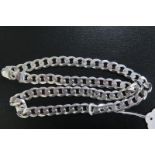 As new Gents silver flat curb necklace, approx 26". Weight 119.3g