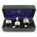 Boxed silver three piece cruet plus a silver non-matching Victorian salt spoon hallmarked