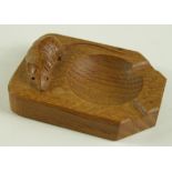 Robert 'Mouseman' Thompson carved oak ashtray, with carved mouse signature, 75mm x 100mm approx.
