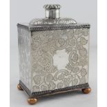 White metal & copper ornately decorated tea caddy, raised on four ball feet, marks rubbed, height