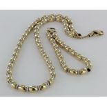 14ct yellow and white gold beaded necklace and bracelet set, total weight 57.3g