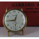 Gents 9ct Gold Garrard wristwatch, scratch to glass, dial diameter 27mm approx., contained in