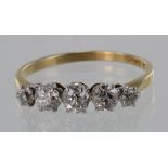 18ct yellow gold graduated diamond five stone ring, total diamond weight approx. 0.60ct. Size O,