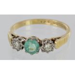 18ct yellow gold zircon and diamond three stone ring, finger size Q, weight 3.6g