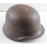 German WW2 helmet complete with lining.