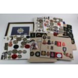 Large collection on boards of various military cloth badges, printed, bullion, embroidered, etc. (