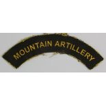 Cloth Badge: MOUNTAIN ARTILLERY WW2 rare printed cloth shoulder title badge in excellent unworn