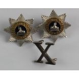 Lincolnshire Regiment pair of Officers silver gilt star pattern collars, plus a Wolesley Helmet