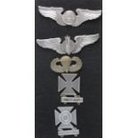 United States sterling silver Wings and Shooting Badges. The PARA badge is by J R Gaunt London. (5)