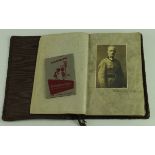 Leather album containing postcards & photos of WWII German officers   (approx 30)