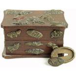 Japanese interest - a very small wooden box covered in 29 Menuki. Box contains a loose Kashira and