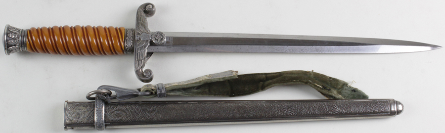 German WW2 Army Dagger with metal scabbard and part original 'D.R.G.M.' hanger. Blade maker