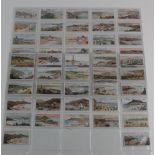 Wills, Seaside Resorts, complete set in pages + 3 duplicates, mainly VG cat value £750