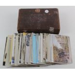 Old cigar box of UK postcards, noted are some Attwells, a few to identify, some London, a Dorando