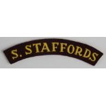 Cloth Badge: S.STAFFORDS rare WW2 embroidered felt shoulder title badge in excellent unworn