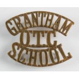 Grantham School OTC shoulder title in brass