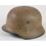 German WW2 steel M35 helmet, painted in Afrika Korps colours, Palm tree symbol to side, with liner.